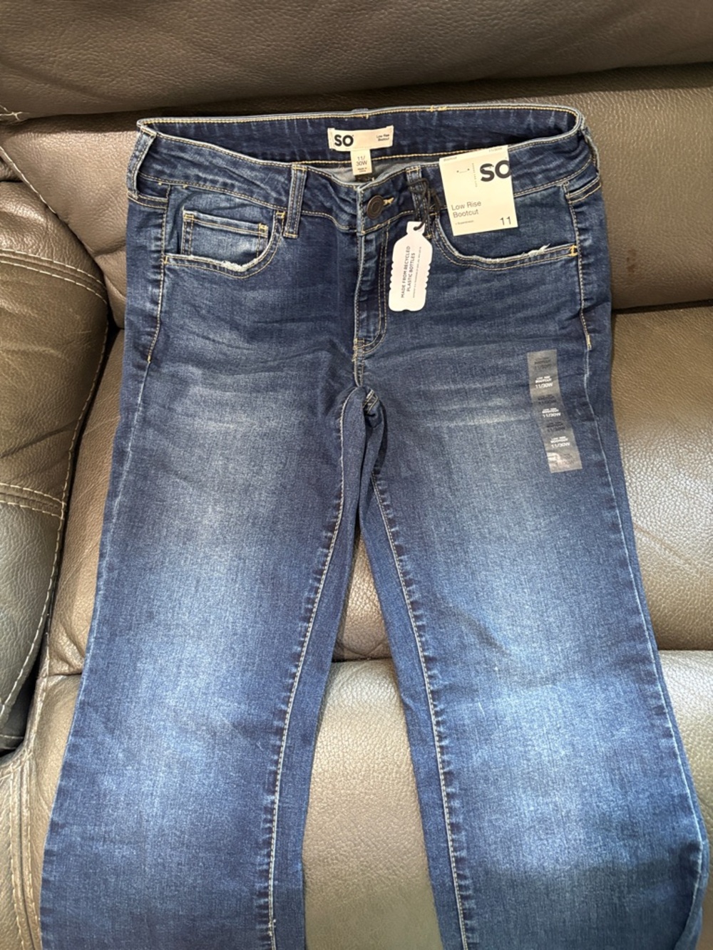So denim low rise boot cut jeans